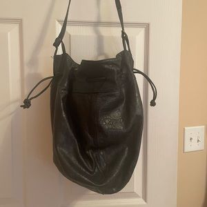 Black leather bucket w/inside pockets